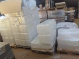 a large amount of boxes and pallets in a warehouse