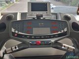 a monitor on the tread machine in the gym