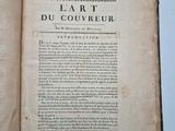 an open book with a picture of a man on it