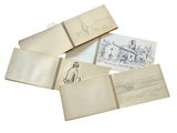 a pile of old books with drawings on them