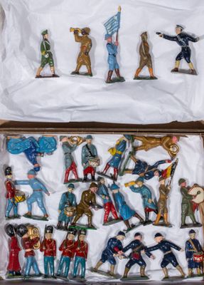 many figurines in a box on the table