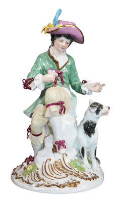figurine of a woman with a dog on a white background