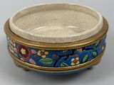 an image of a small bowl with flowers on it