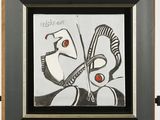 painting of a woman and a man with red eyes in a black frame