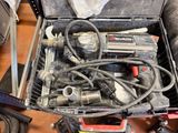 a tool box full of tools on a table