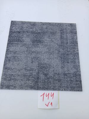 a piece of gray fabric with red writing on it
