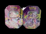 two pokemon cards are in a box on a black background