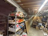 a room filled with lots of boxes and shelves