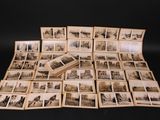 a lot of old photos on a black table