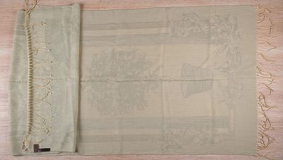 a piece of cloth that has been stitched together on a table