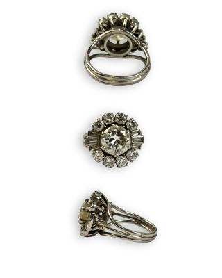 three rings and a ring with a flower on top of it