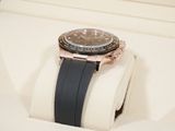 a watch that is sitting on top of a watch stand