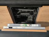 a dishwasher in the middle of a kitchen counter
