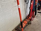 two jacks sitting next to each other in a garage