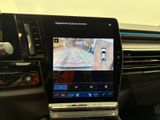 the dashboard of a car with a car camera on the dashboard