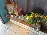 a table with a bunch of flowers and a picture on it