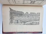 an open book with a drawing of a roman ampule on it
