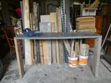 a table that has a lot of wood on top of it