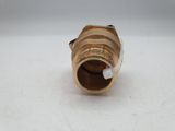 a close up of a brass hose fitting on a white surface