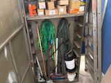 a small storage area with a lot of items in it