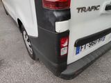 a white van that is parked in a parking lot