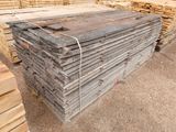a pile of wooden planks stacked on top of each other