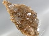 crystal on a clear stand on a white surface