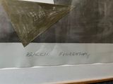 a picture of a piece of art with a piece of paper on it