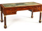 a small desk with a marble top and two drawers