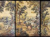 three panels of a tapestry depicting a landscape with trees and animals