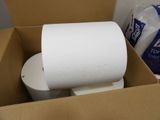 a cardboard box with a toilet paper roll in it