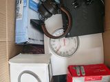 a box full of headphones and other electronics in it
