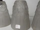 three vases that are sitting on a table