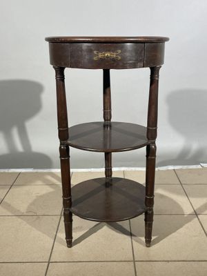an image of a corner table with two shelves