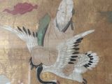 a painting of a man holding a crane in his hand