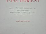 the front cover of an old book with red writing on it