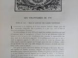 an open book with a picture of a sunflower on it