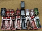 a lot of old model trains sitting on the floor