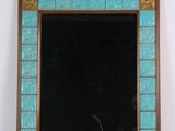 turquoise and gold mosaic mirror with a wooden frame