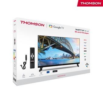 La télévision est dans la boîte, avec la télécommande posée dessus.