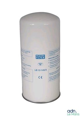 a close up of a white oil filter on a white background