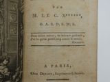 an open book with a picture of a woman sitting in a chair