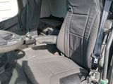 a seat in the back of a van that is empty