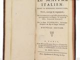 an open book with a picture of a bird sitting on top of it