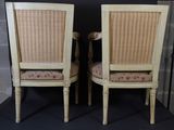 pair of antique cane back dining chairs with upholstered cushions