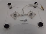 a picture of a clear controller that is sitting on a table