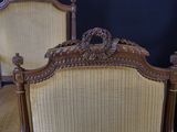 two chairs that are next to each other in a room
