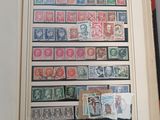a book with a bunch of stamps on it
