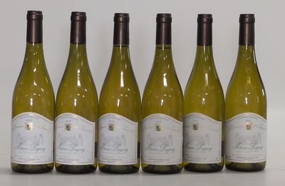 six bottles of white wine lined up in a row on a table