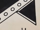 a black and white drawing of a triangle with a screw in it